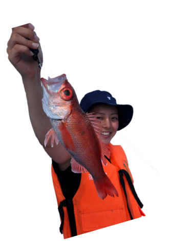 金目鯛を釣った女性